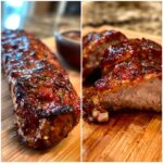 Close-up of a glistening maple mustard pork tenderloin, sliced to reveal juicy interior.
